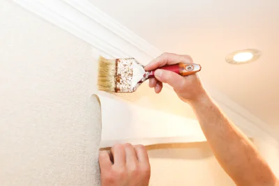 Pose de papier peint à la Fouillade — revêtements muraux et toiles de verre